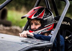 Woman Driving Rebel Buggy | Designaventure