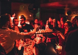 Hen party doing Limbo bar at Revolucion de Cuba