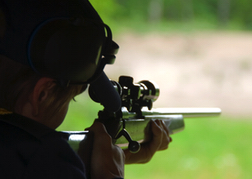 Stag Shooting A Rifle