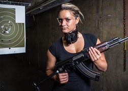 A Lady holding a Rifle Shooting in Hamburg