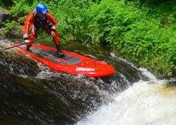 SUPing in North Wales on a river