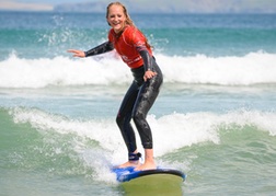 Surfing hen in Newquay