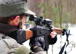 Man from a stag party Shooting a rifle