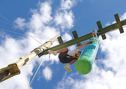 Man doing Tarzan Time High Rope Adventure in Bristol on a stag do