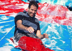 man taking part in the Total Wiped Out Activity on a stag weekend