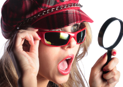 Lady on a hen weekend with a magnified glass looking for treasure