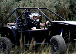 A man form a stag party racing a WA Rebel Kart