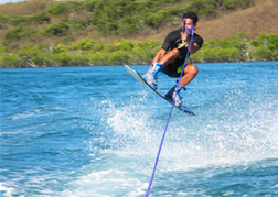 man jumping on a Wakeboarding on a stag do