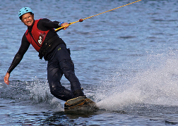 man learning to Wakeboard on a stag weekend