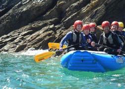 White Water Sea Rafting for a stag group on a beautiful sunny day