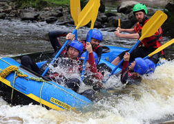 stag group taking part in White Water Rafting 