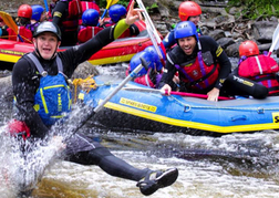 huge stag group taking part in White Water Rafting 