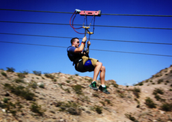 Man Zipwiring Las Vegas on a stag do