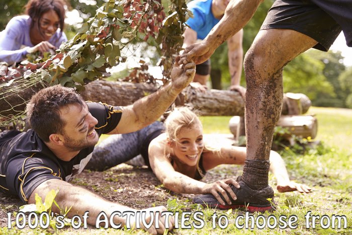  Man and a lady competing in a team building challenge 