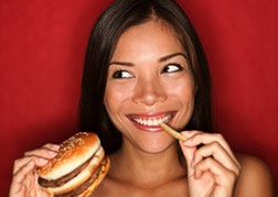 Hen Eating A Burger