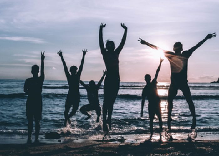 Stag Group on a Newquay beach at sunset