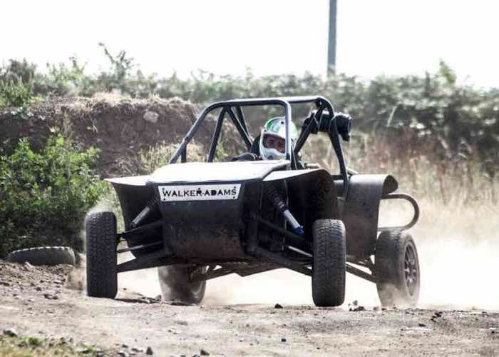 Rage Buggy racing leaving a dust cloud