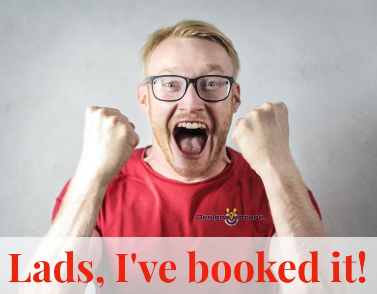 Man wearing a red t-shirt celebrating just booked his stag do